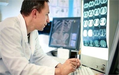 Picture of a male Physician looking at ct scan results. A CT scan - also called computerized tomography or just CT - is an X-ray technique that produces images of your body that visualize internal structures in cross-section rather than the overlapping images typically produced by conventional X-ray exams. Conventional X-ray exams use a stationary X-ray machine to focus beams of radiation on a particular area of your body to produce two-dimensional images on film or digital detector, much like a photograph. However, CT scanners use an X-ray unit that rotates around your body and a powerful computer. The result is a set of cross-sectional images, like slices, of the inside of your body.