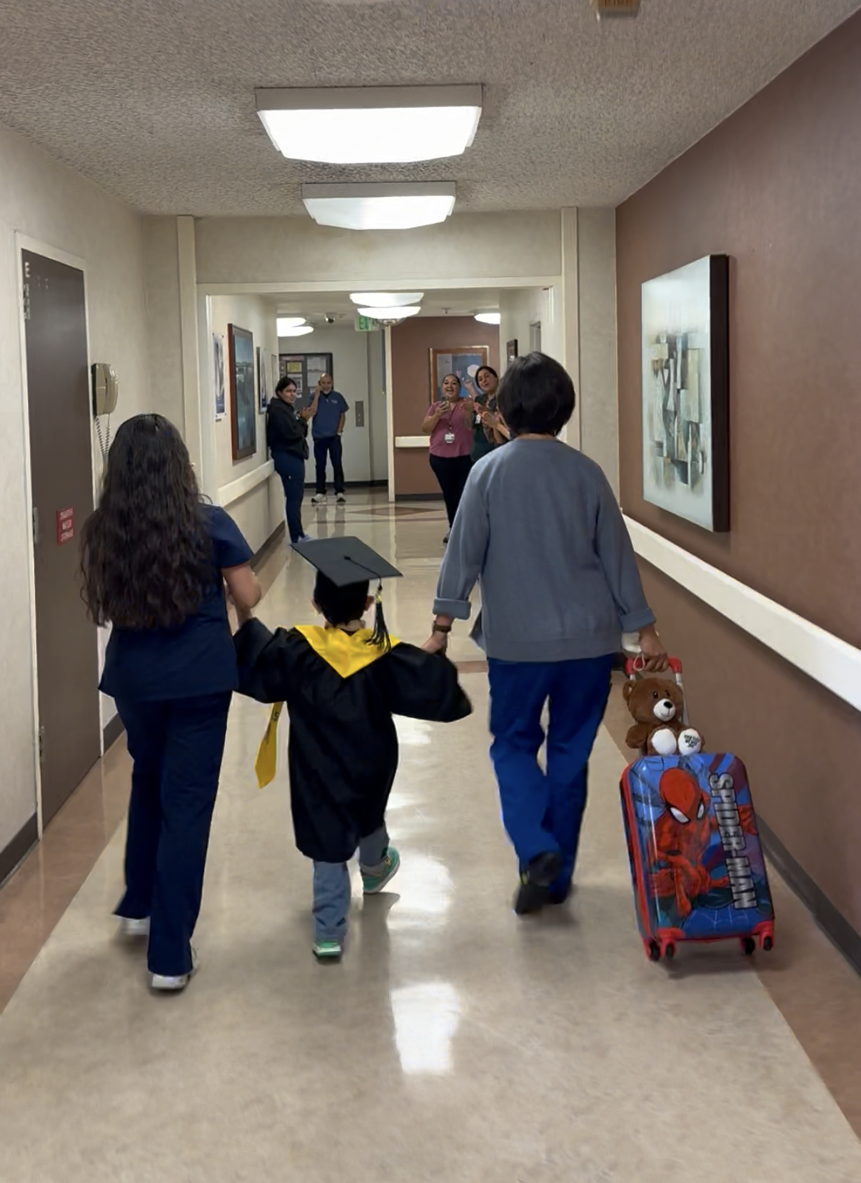 Young patient graduates from Whittier Pediatric Subacute